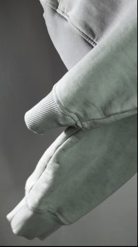 Close-up of the Infinite Hoodie fabric and tonal graphic